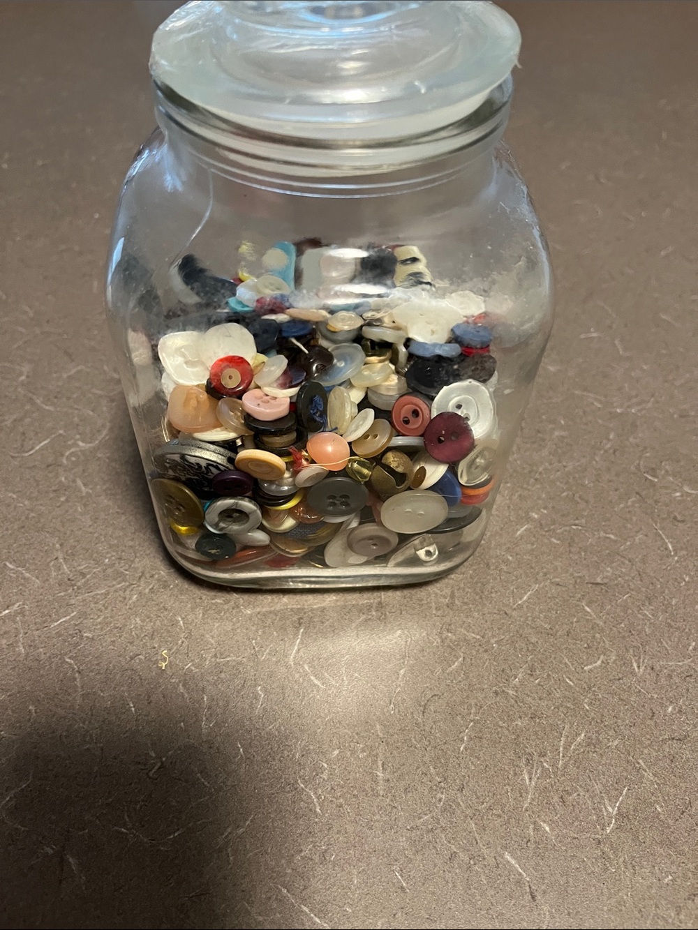 1/2 filled with multicolour buttons and misc. Some vintage